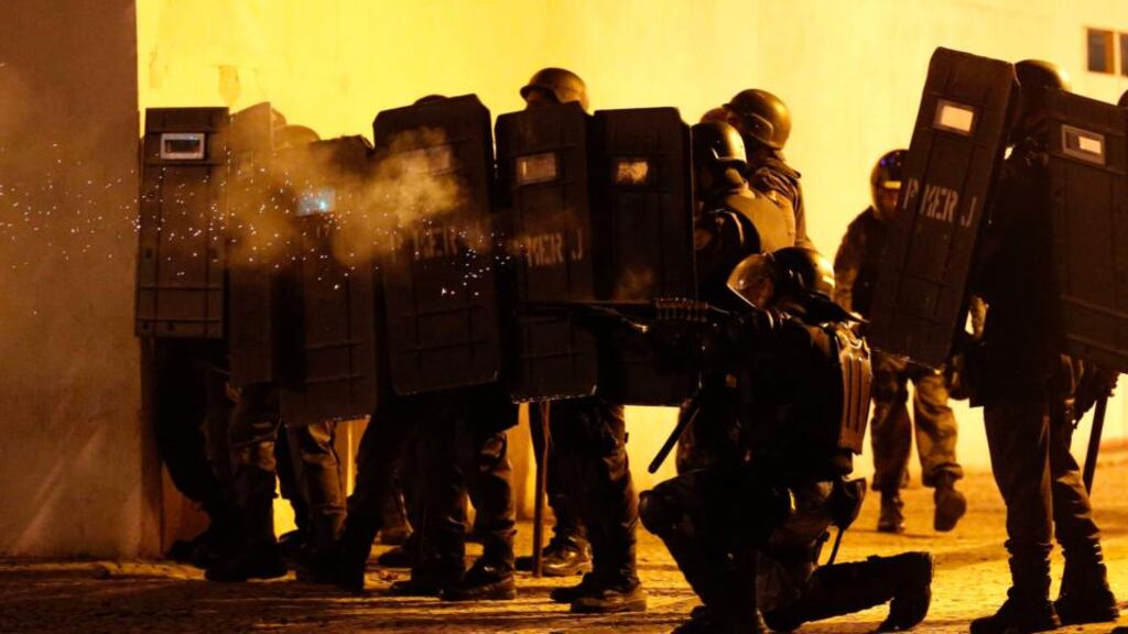 Riot police fire tear gas towards protesters during a protest in Rio de Janeiro. Photograph: Sergio Moraes/Reuters