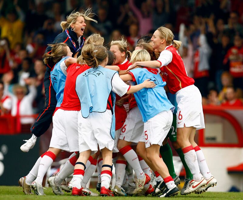 Arsenal team celebrates after winning the Womens UEFA Cup final. Photograph: Ian Walton/Getty