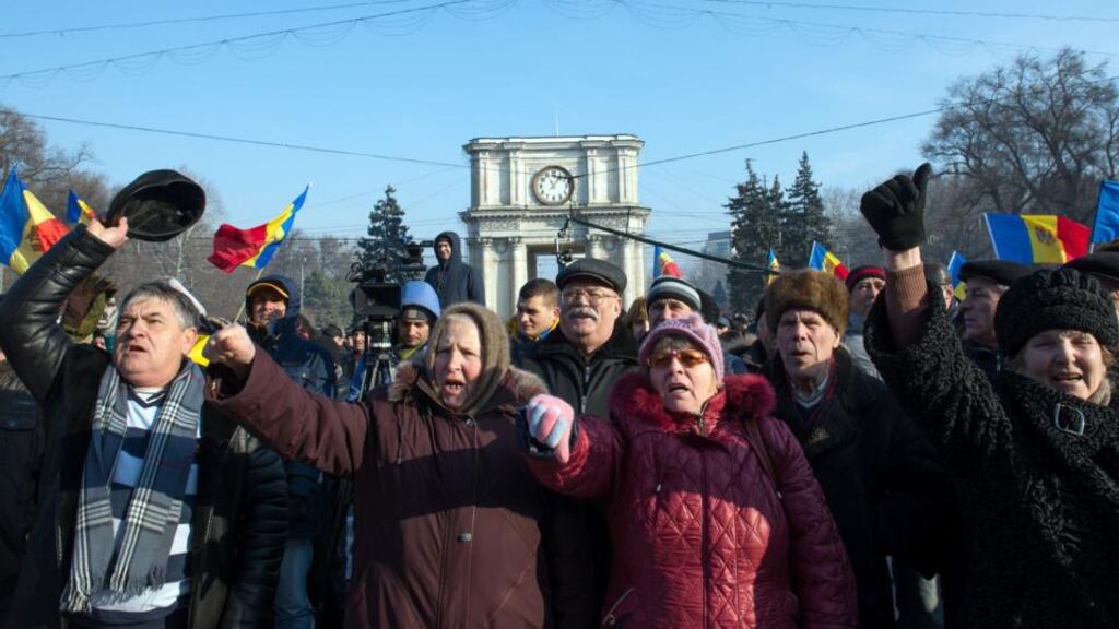 People attending a rally in front of the parliament building in Chisinau, Moldova, on Thursday. Photograph: Dorin Goian/AFP/Getty Images