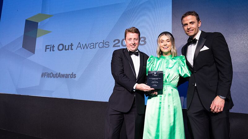 Adrian McDermott, commercial director at Azure Contracting, presents the fit out project of the year – conservation award to Rebecca Wadsworth and Michael Conaghan, Henry J Lyons