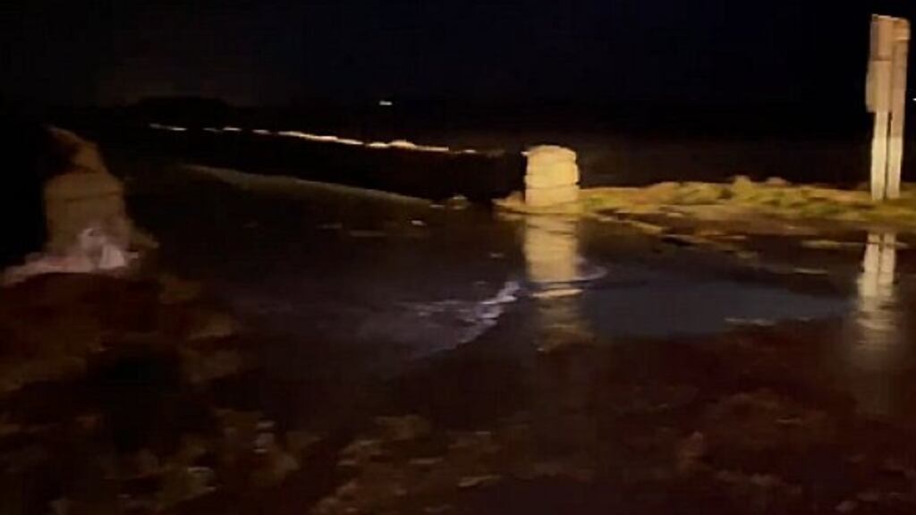 Flooding on Droichead Charraig a Logáin which erodes the surface.