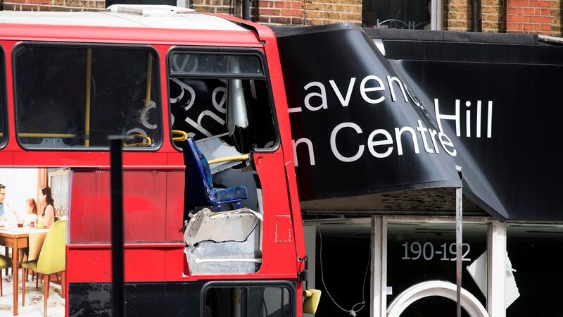 Emergency services at the scene in Lavender Hill, southwest London, after a bus crashed. Photograph: Will Oliver/EPA