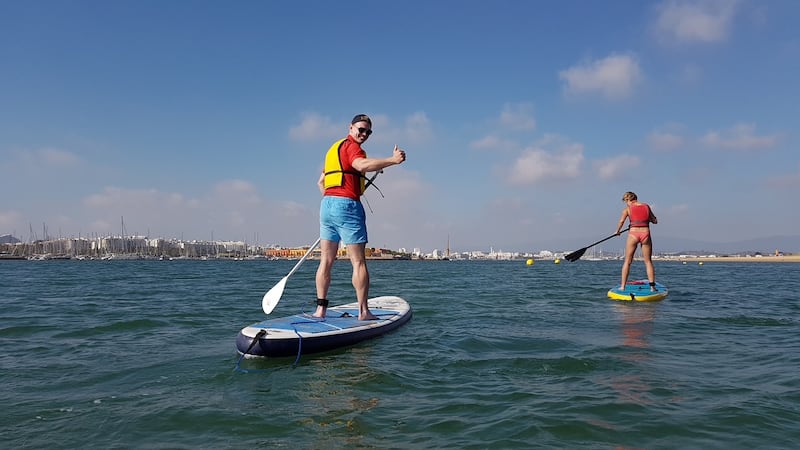 Group members take part in the paddleboarding session during a recovery day.