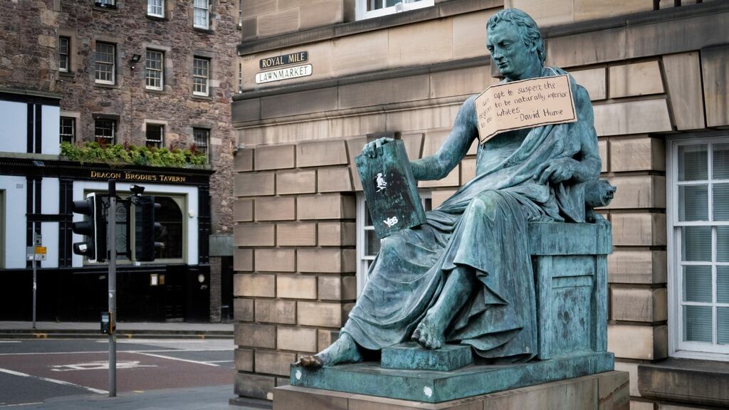 Statue of the 18th-century philosopher David Hume on the Royal Mile, Edinburgh: ‘Hume . . . is probably not much more implicated in the slave trade than many of us are today,’ says his latest biographer Julian Baggini. Photograph: Jane Barlow/PA