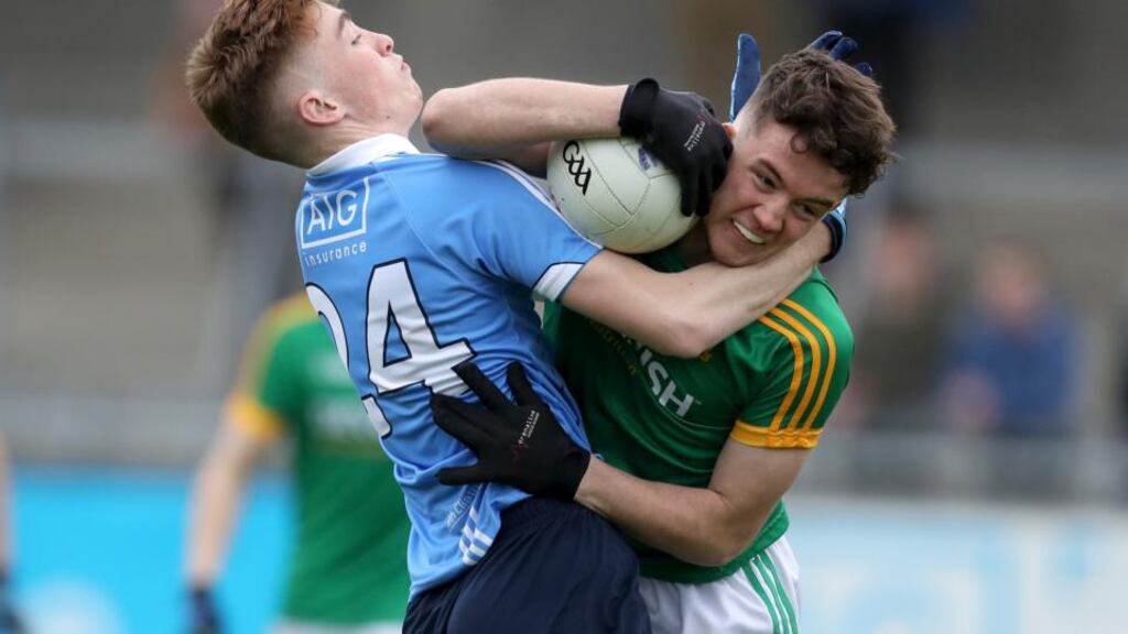 Dublin’s David Lacey and Meath’s Niall Mulvey in action during the Electric Ireland Leinster MFC round one match at Parnell Park. Photograph: Bryan Keane/Inpho