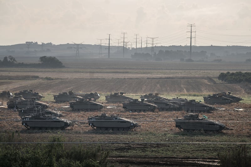 Israeli army tanks, part forces the country has amassed outside of Gaza in preparation for what is widely expected to be an invasion, near Erez, Israel. Photograph: Sergey Ponomarev/The New York Times