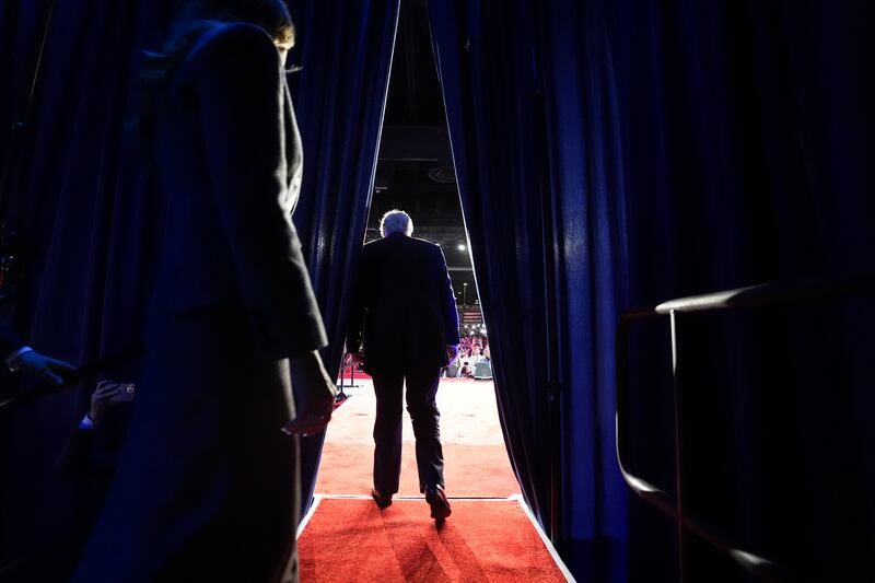Donald Trump walks on stage with Melania Trump during an election night event at the Palm Beach County Convention Center. Photograph: Doug Mills/The New York Times