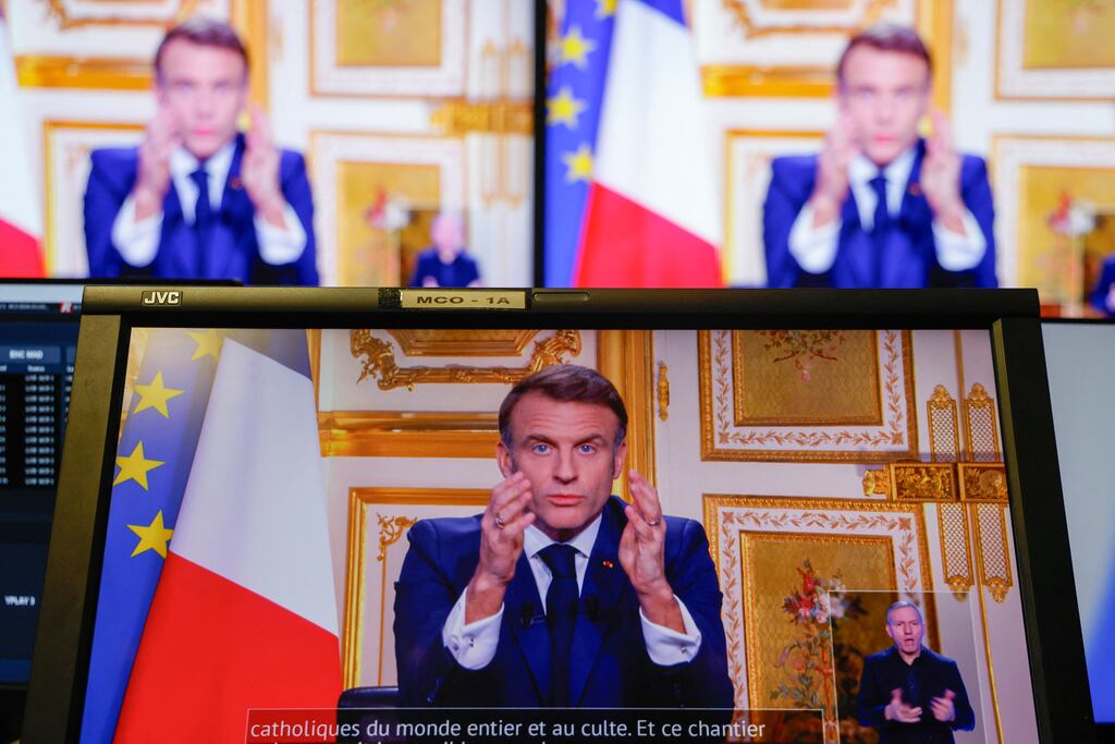 French president Emmanuel Macron addresses the nation during a televised broadcast from the presidential Elysee Palace on Thursday. Photograph: Ludovic Marin/AFP via Getty Images