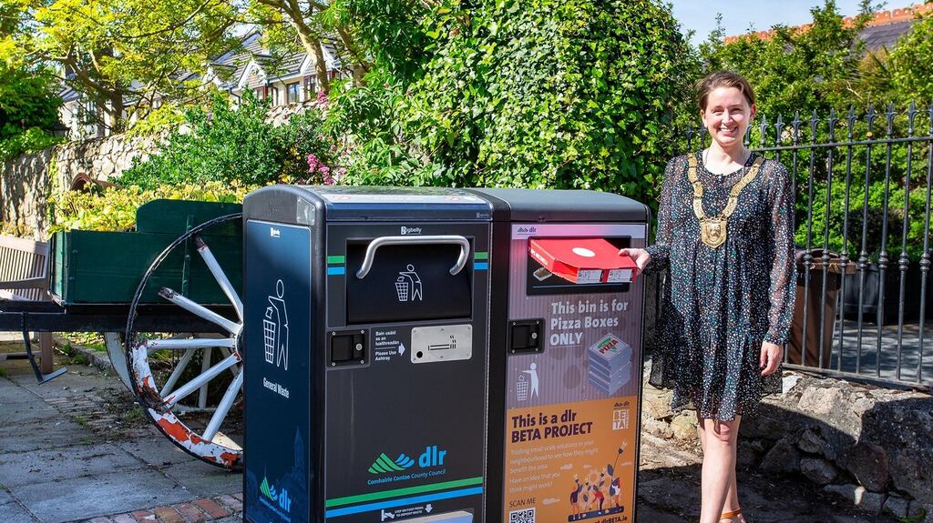 Cathaoirleach of Dún Laoghaire-Rathdown County Council Una Power is pictured trying out the new pizza box bins. Photograph: Peter Cavanagh