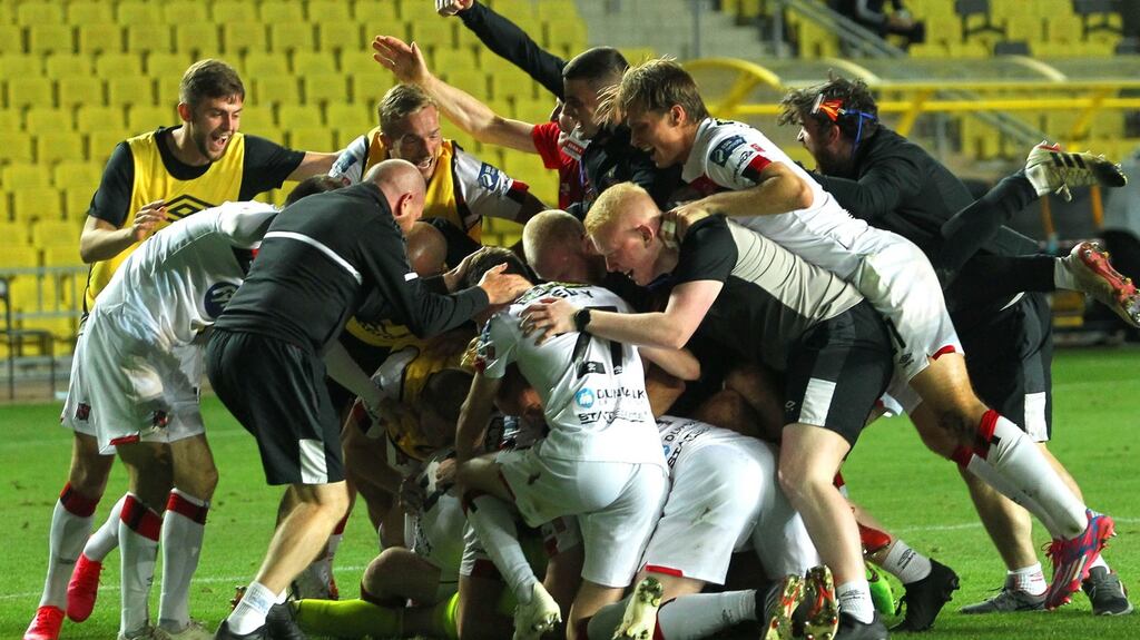 Dundalk players celebrate their penalty shoot-out victory over Sheriff Tiraspol in the third qualifying round of the Europa League. Photograph: Aleksandar Djorovic/Inpho