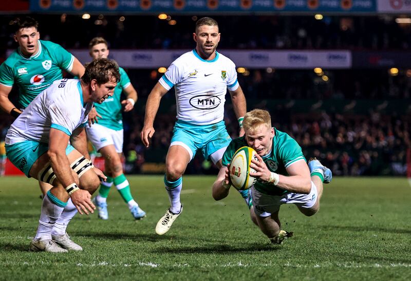 Ireland's Jamie Osborne dives over for a try at Loftus Versfeld Stadium. Photograph: Dan Sheridan/Inpho