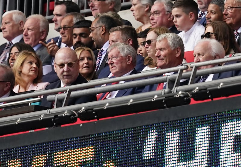 Man Utd co-chairman Avram Glazer (left) and Alex Ferguson (centre) in the stands during the Emirates FA Cup final Wembley. Photograph: Martin Rickett/PA