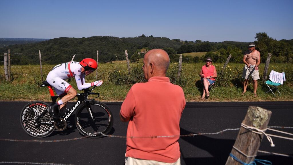 Ireland’s Daniel Martin rides past fans during the 13th stage of the 106th edition of the Tour de France cycling race, a 27.2-kilometre individual time-trial in Pau, on Friday. Photograph: Marco Bertorello/AFP/Getty Images