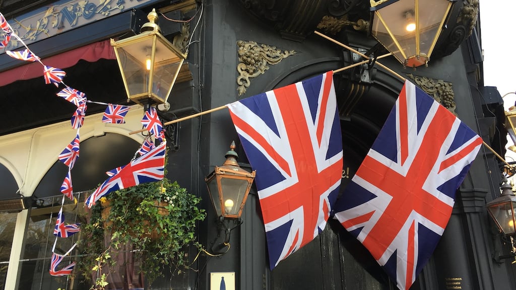 Union Jacks outside a pub in Chelsea, London, England. Photograph: Bryan O’Brien