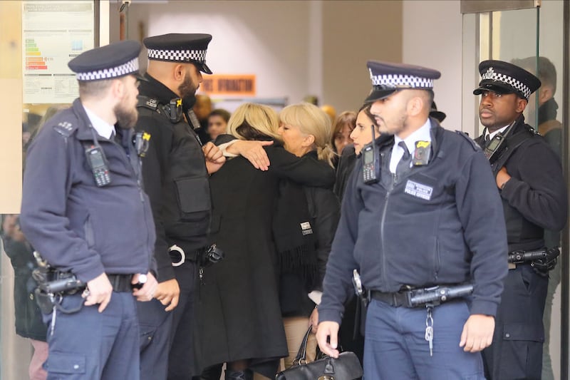 Caroline and Christine hugging outside Highbury Corner Magistrates Court, London, on 23rd December, 2019.  Photograph: Mark R Milan/GC Images
