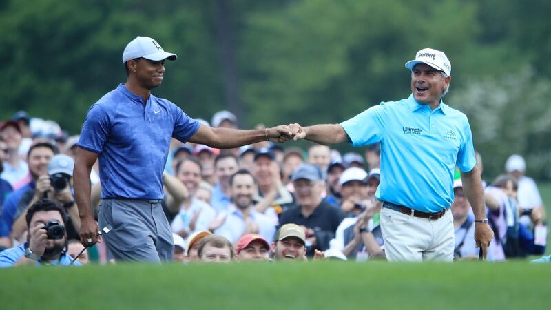Tiger Woods and Fred Couples of the United States on the 12th tee during a practice round at Augusta National yesterday. Photograph: Andrew Redington/Getty Images