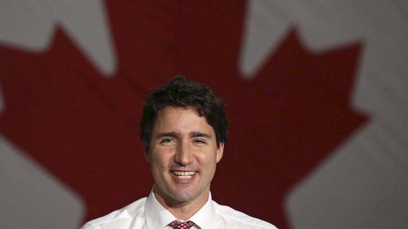 Liberal leader Justin Trudeau smiles during a campaign rally in Winnipeg, Manitoba, at the weekend. Canadians go to the polls in a federal election today. Photograph: Reuters/Chris Wattie