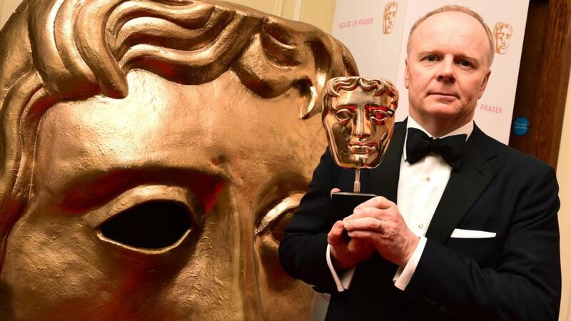 Jason Watkins with his Bafta award for his performance as the murder accused in ITV drama The Lost Honour of Christopher Jefferies. Photograph: Ian West/PA Wire
