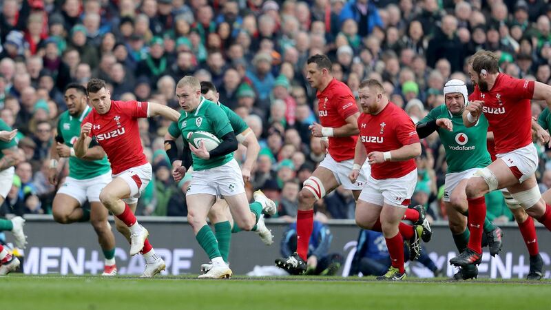 Keith Earls makes a break. Photograph: Dan Sheridan/Inpho