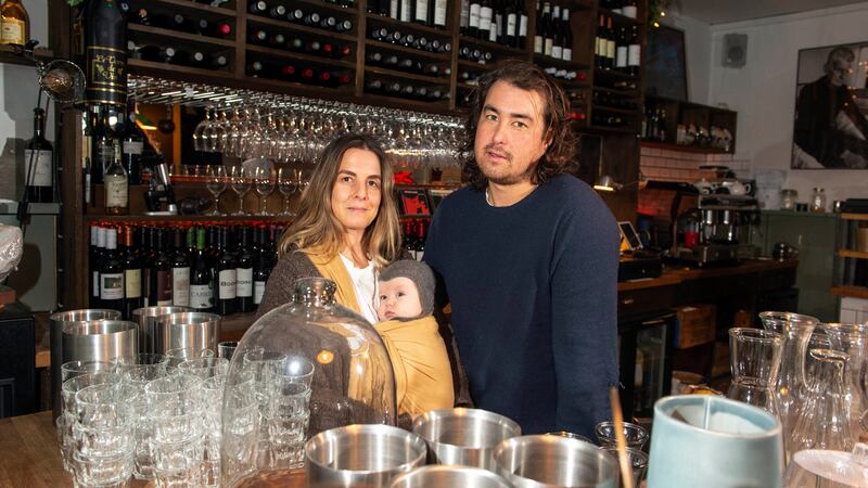 Siobhan Waldron, five-month old baby Cass and her husband Gavin Ryan, in their wine bar, The Black Pig, Kinsale, Co Cork. Photograph: Michael MacSweeney/Provision