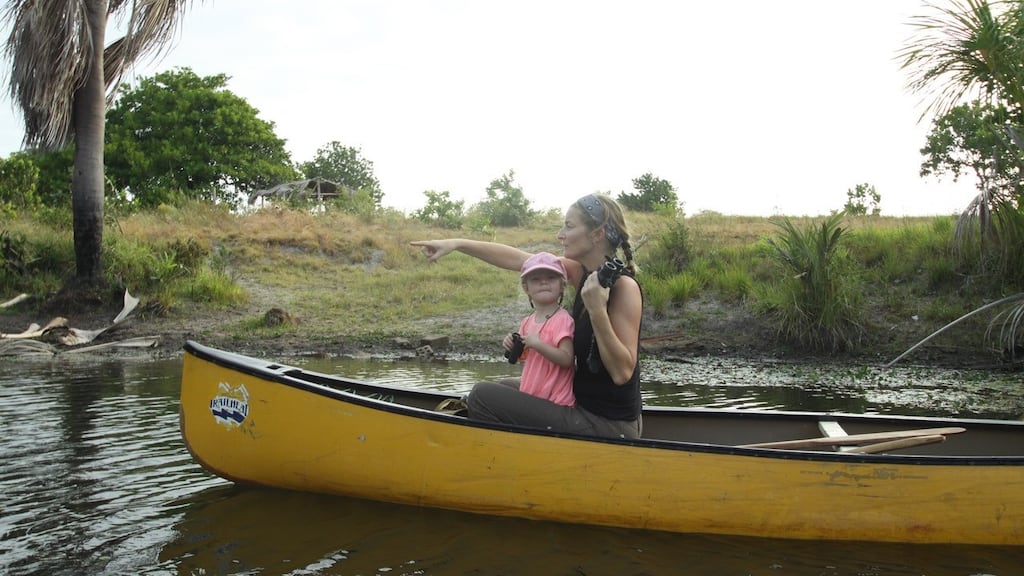 Take your child to work day: “Teaching my daughter how to spot wildlife along the river, although she wasn’t nearly as interested by the Giant river otter as I was!” Dr Anouska Kinahan with Luna in Guyana