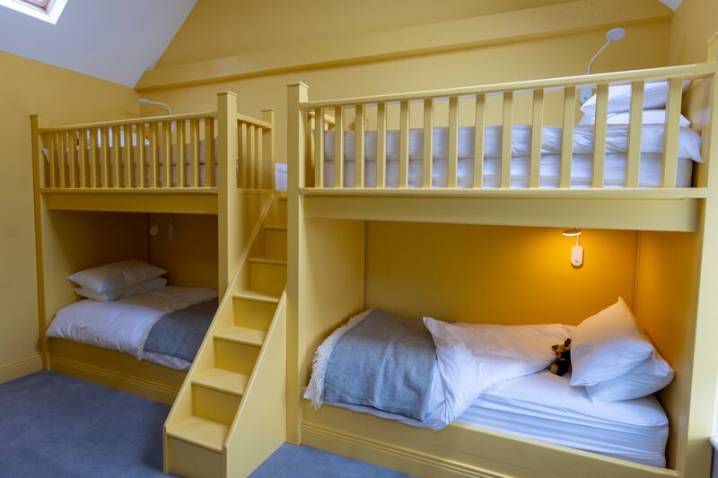 The family room at Currane House has custom-built bunkbeds that can sleep up to four, in addition to a double bed for parents
