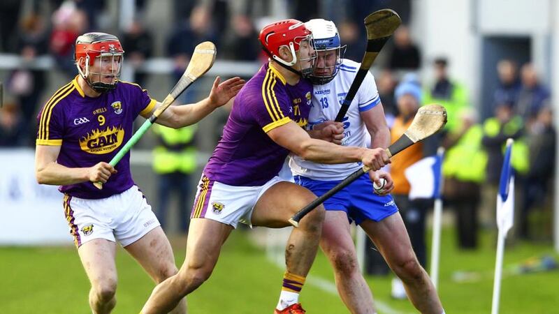 Waterford’s Stephen Bennett is tackled by Wexford’s Lee Chin during the Allianz Hurling League Division 1A match at Walsh Park. Photograph: Ken Sutton/Inpho