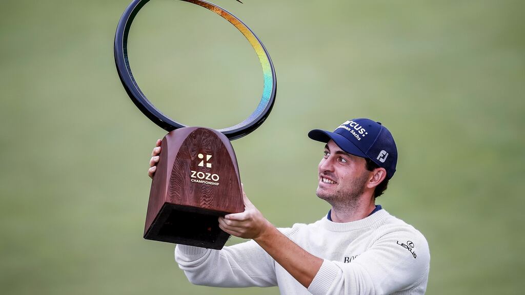 Patrick Cantlay with the trophy after inning the Zozo Championship. Photograph: Etienne Laurent/EPA