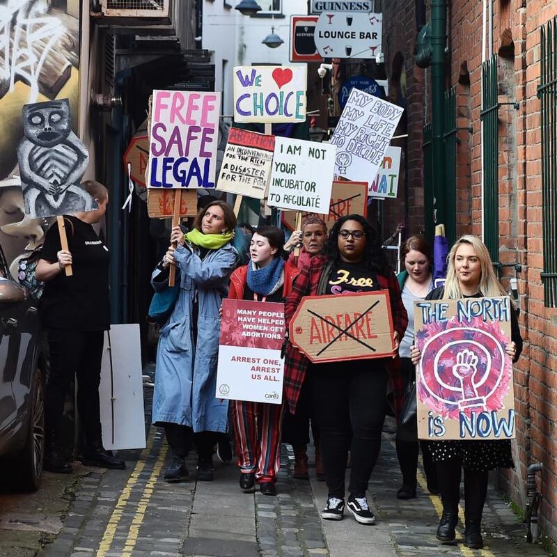 Abortion-rights demonstrators march through the streets of Belfast ahead of a meeting of the Assembly. Photograph: Charles McQuillan/Getty
