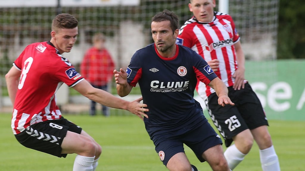 St. Pat’s Christy Fagan and Derry’s Harry Monaghan during their side’s 1-1 draw at the Brandywell. Photograph: Inpho