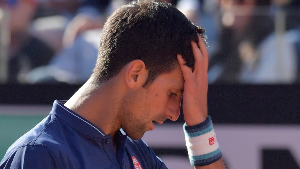 Novak Djokovic reacts after being beaten by Alexander Zverev of Germany in the Italian Open. Photo: Tiziani Fabi/Getty Images