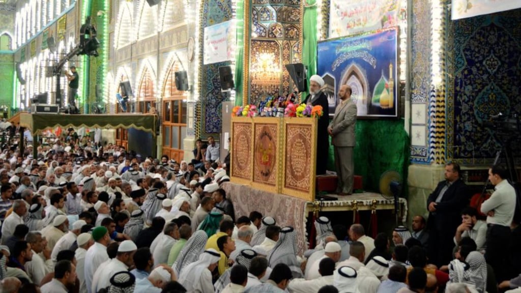 Shi’ite Muslims listen to Sheikh Abdulmehdi al-Karbalai speak during Friday prayers at the Imam Hussein shrine in the holy city of Kerbala. Photograph: Reuters/Mushtaq Muhammed