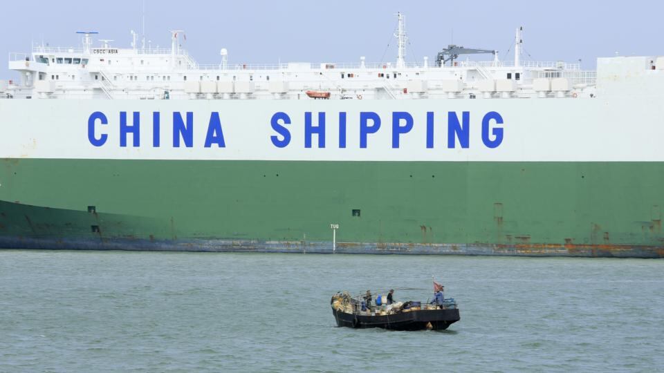 Megopolis: a car carrier in the port that first attracted Europeans to the area. Photograph: Nelson Ching/Bloomberg