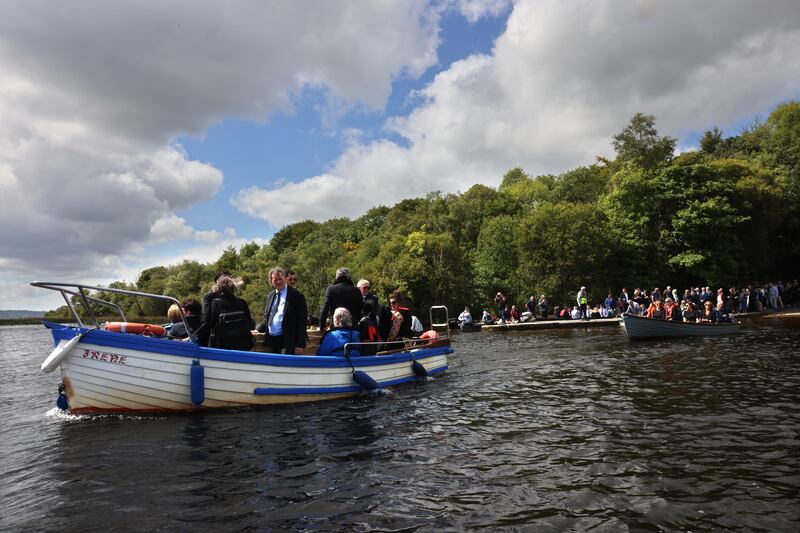 Carlo Gebler stands beside the remains of his mother Edna O’Brien on way to the burial ground on Holy Island, Co Clare. Photograph: Dara Mac Dónaill/The Irish Times