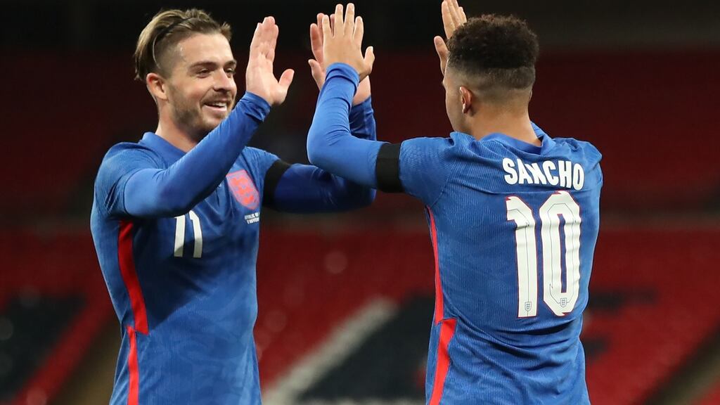 England’s Jack Grealish congratulates Jadon Sancho after his goal against the Republic of Ireland. Photo: Getty Images