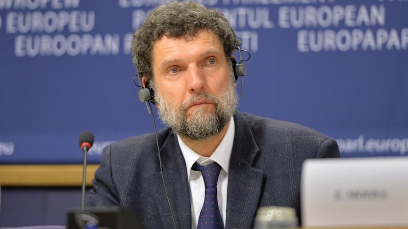 Member of the International Peace and Reconciliation Initiative delegation to Turkey Osman Kavala at a press conference with in Brussels in 2014. Photograph: Dursun Aydemir/Anadolu Agency/Getty Images