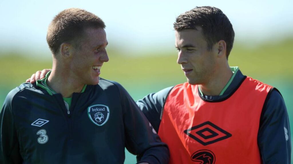 James McCarthy (left) shares a joke with his new clubmate at Everton Séamus Coleman, during Ireland training at Gannon Park on Tuesday. Photograph: Donall Farmer/Inpho
