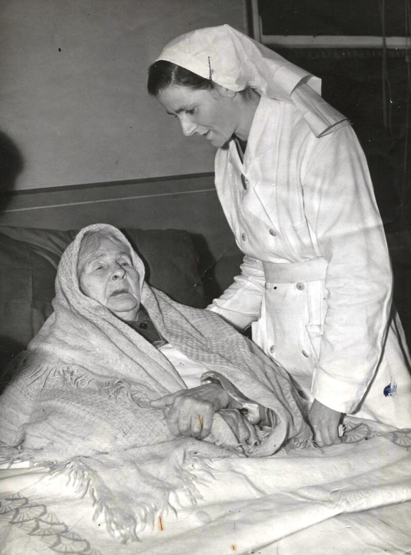 Peig Sayers: the storyteller with her Irish-speaking nurse, Áine O Friel, at St Anne's Hospital in Ranelagh, Dublin, in a photograph that appeared in The Irish Times on January 9th, 1952