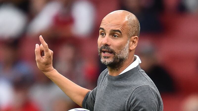 Manchester City’s manager Pep Guardiola. Photograph: Glyn Kirk/AFP/Getty Images