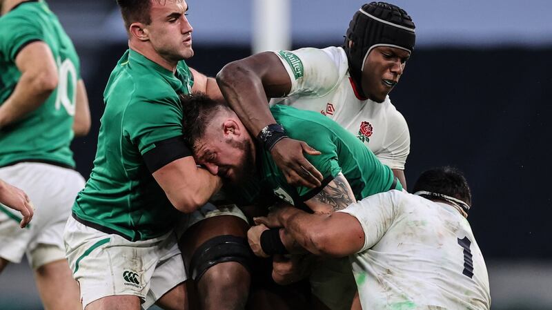 Maro Itoje tackles Andrew Porter during Ireland’s defeat to England. Photograph: Billy Stickland/Inpho