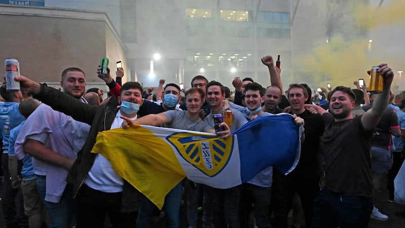 Leeds fans celebrate promotion. Photo: Paul Ellis/AFP via Getty Images