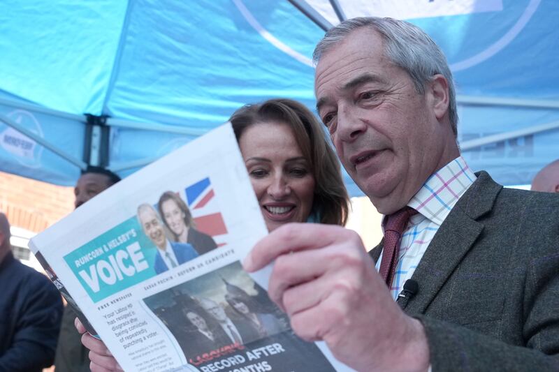 Reform UK leader Nigel Farage, right, and the party's by-election candidate Sarah Pochin. Photograph: Christopher Furlong/Getty