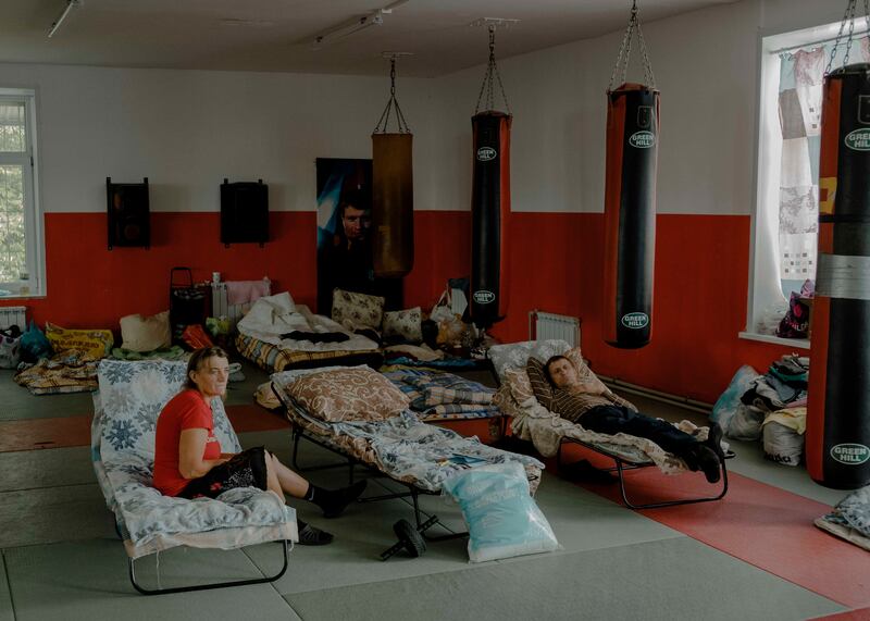 Russians who fled recent Ukrainian military incursions region relax at a boxing gym that has become a shelter in Kursk, Russia. Photograph: Nanna Heitmann/The New York Times