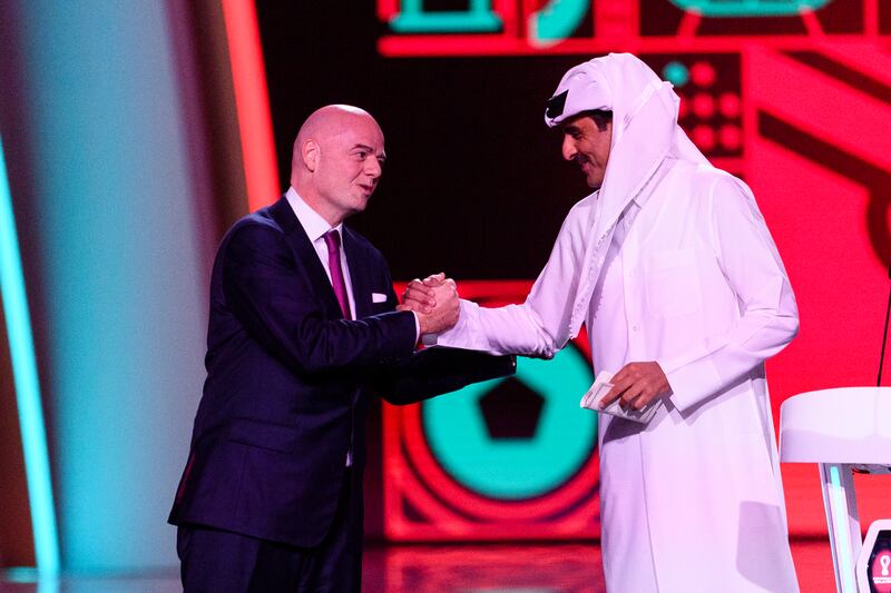 Fifa president Gianni Infantino with Sheikh Tamim bin Hamad Al Thani during the World Cup draw. Photograph: Marcio Machado/Getty Images