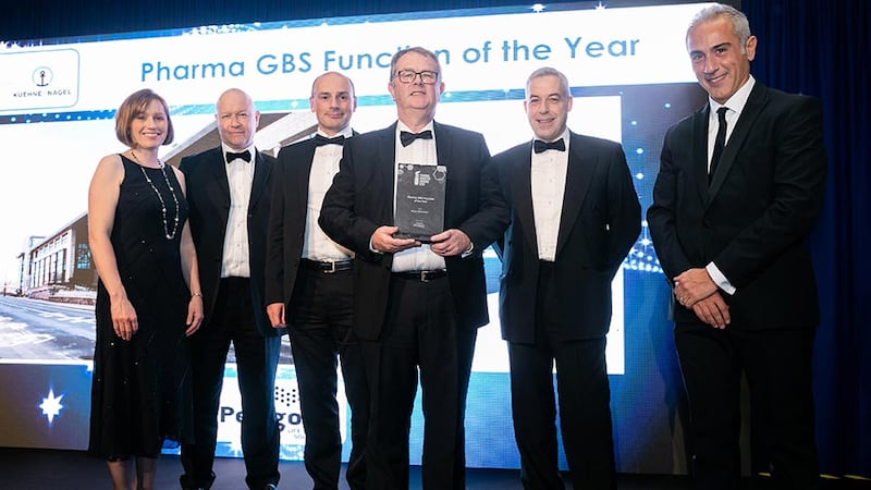 Gabriele Iannizzotto, Chief Business Officer, Perigord Life Science Solutions presents the Pharma GBS Function of the Year award to the Pfizer GBS Dublin team.