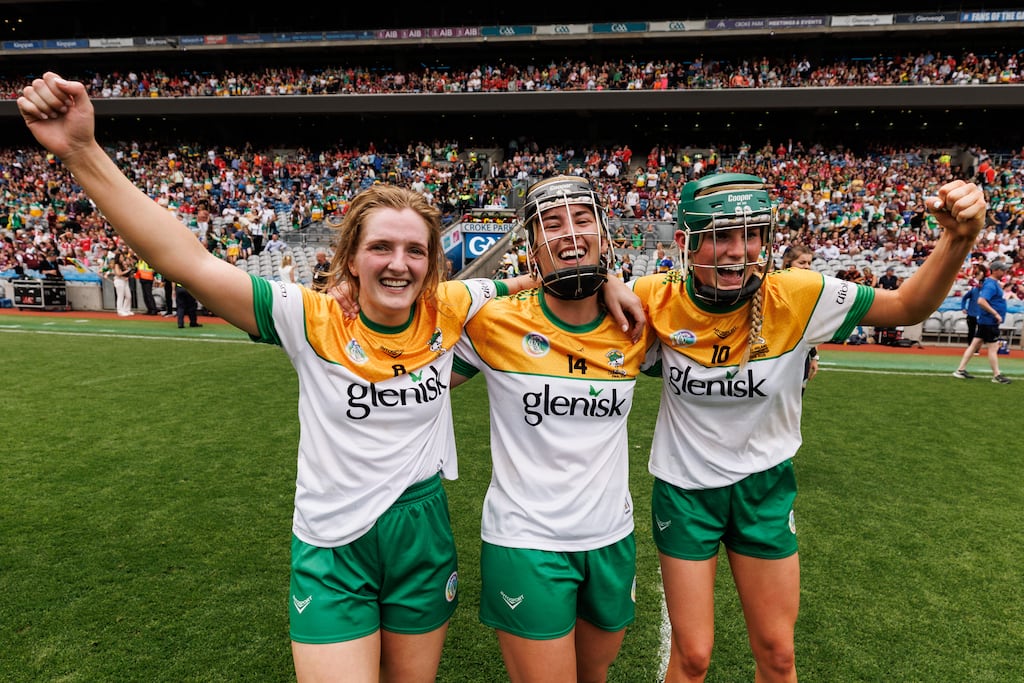 Offaly's Róisín Kinsella, Mairéad Teehan and Grace Teehan celebrate after the final whistle. Photograph: INPHO/ Ben Brady