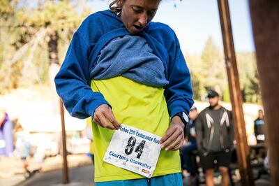 Courtney Dewaulter pins on her number before the start of the Tahoe 200 ultramarathon in Homewood, California on September 7th, 2018. Photograph: Max Whittaker/The New York Times