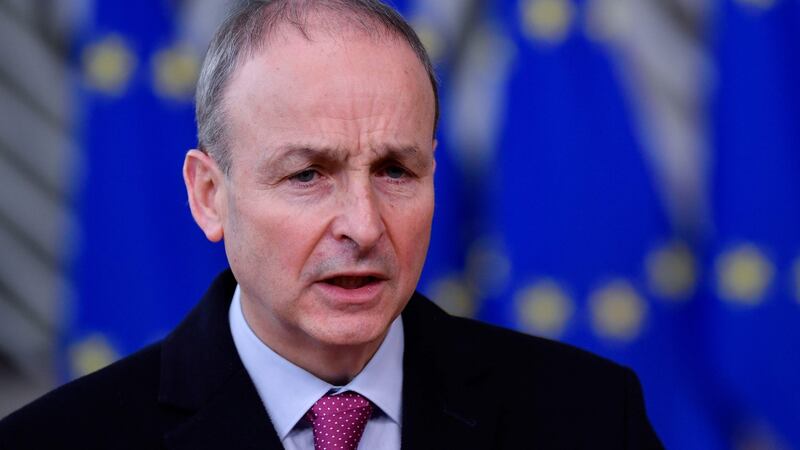 Taoiseach Micheál Martin speaks to the press as he arrives at the EU headquarters’ Europa building in Brussels on Thursday. Photograph: John Thys/pool/Getty