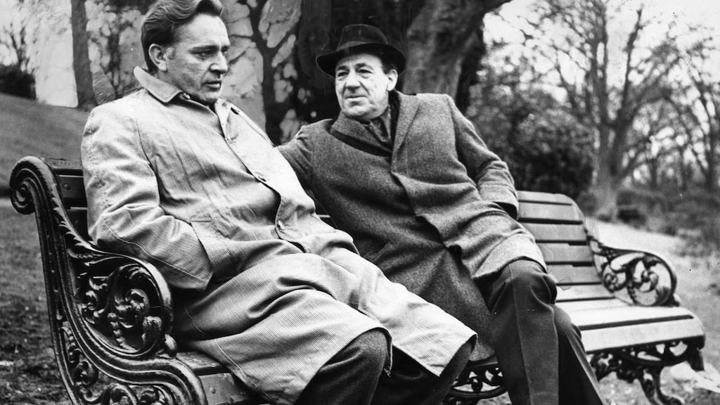 Richard Bruton (left) and Michael Hordern  at Dublin Zoo in 1965 during the filming of ‘The Spy Who Came in from the Cold’. Photograph: Eddie Kelly/ The Irish Times