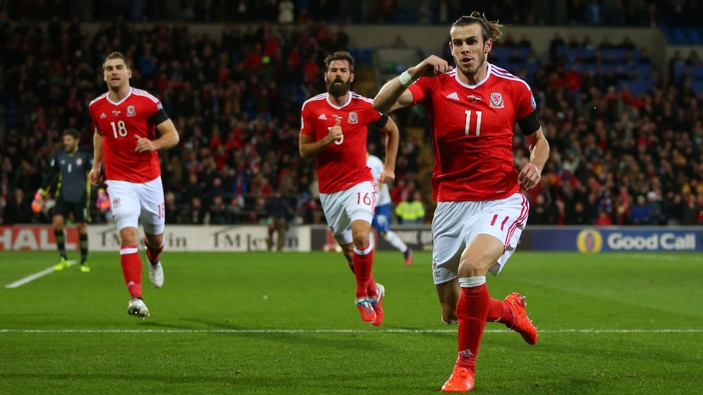 Gareth Bale of Wales celebrates after scoring to make it 1-0 during the FIFA 2018 World Cup Qualifier between Wales and Serbia at Cardiff City Stadium. Photo: Catherine Ivill - AMA/Getty Images